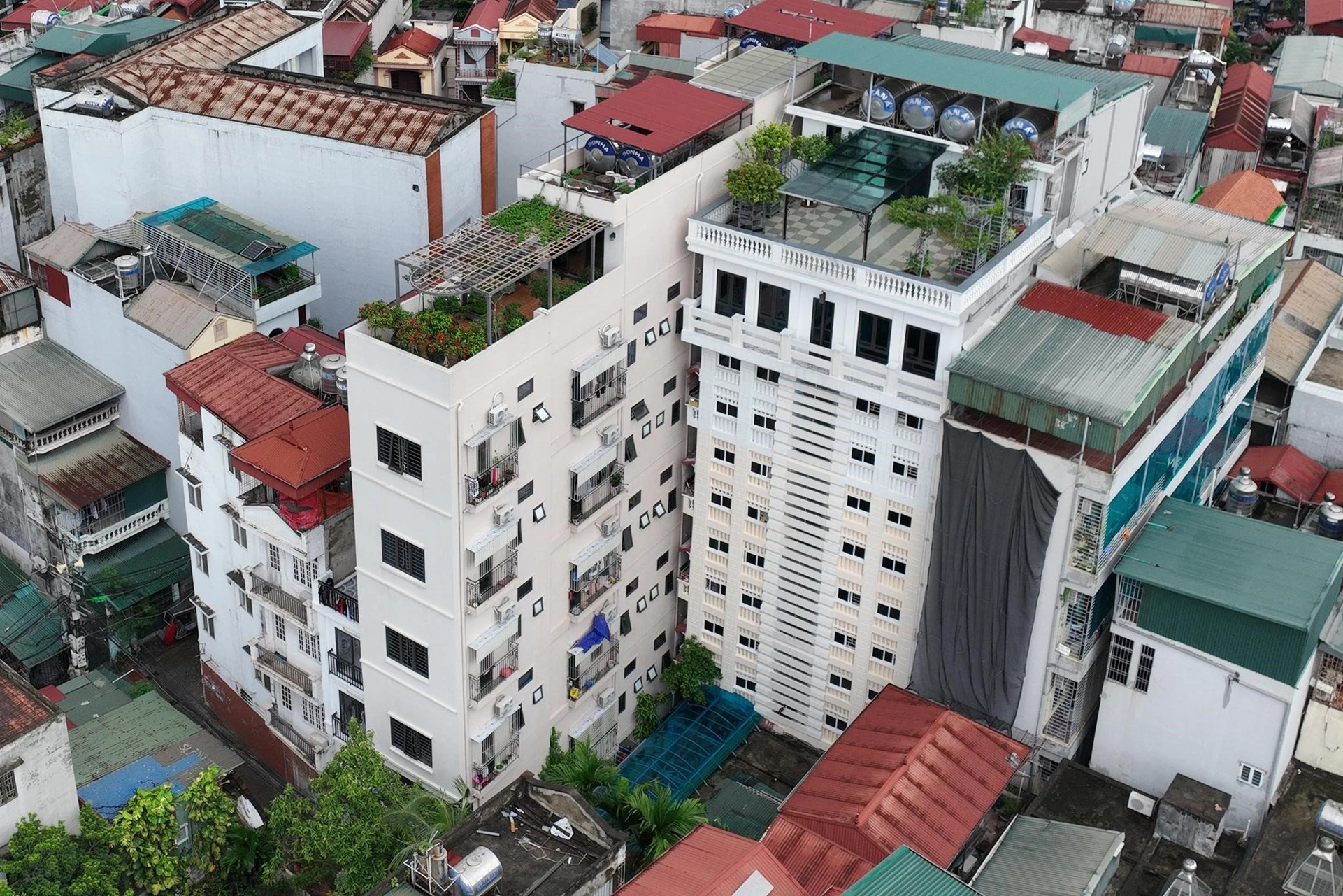 Có 900 triệu nên mua căn hộ chung cư mini hay căn hộ tập thể cũ?